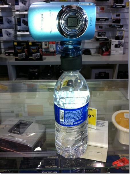 tripod with a water bottle